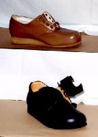 Blucher style orthopedic shoe (top); diabetic sho...