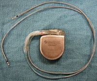 A photograph showing a defibrillator with intact ...