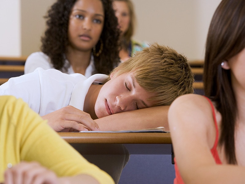 a person sleeping in class